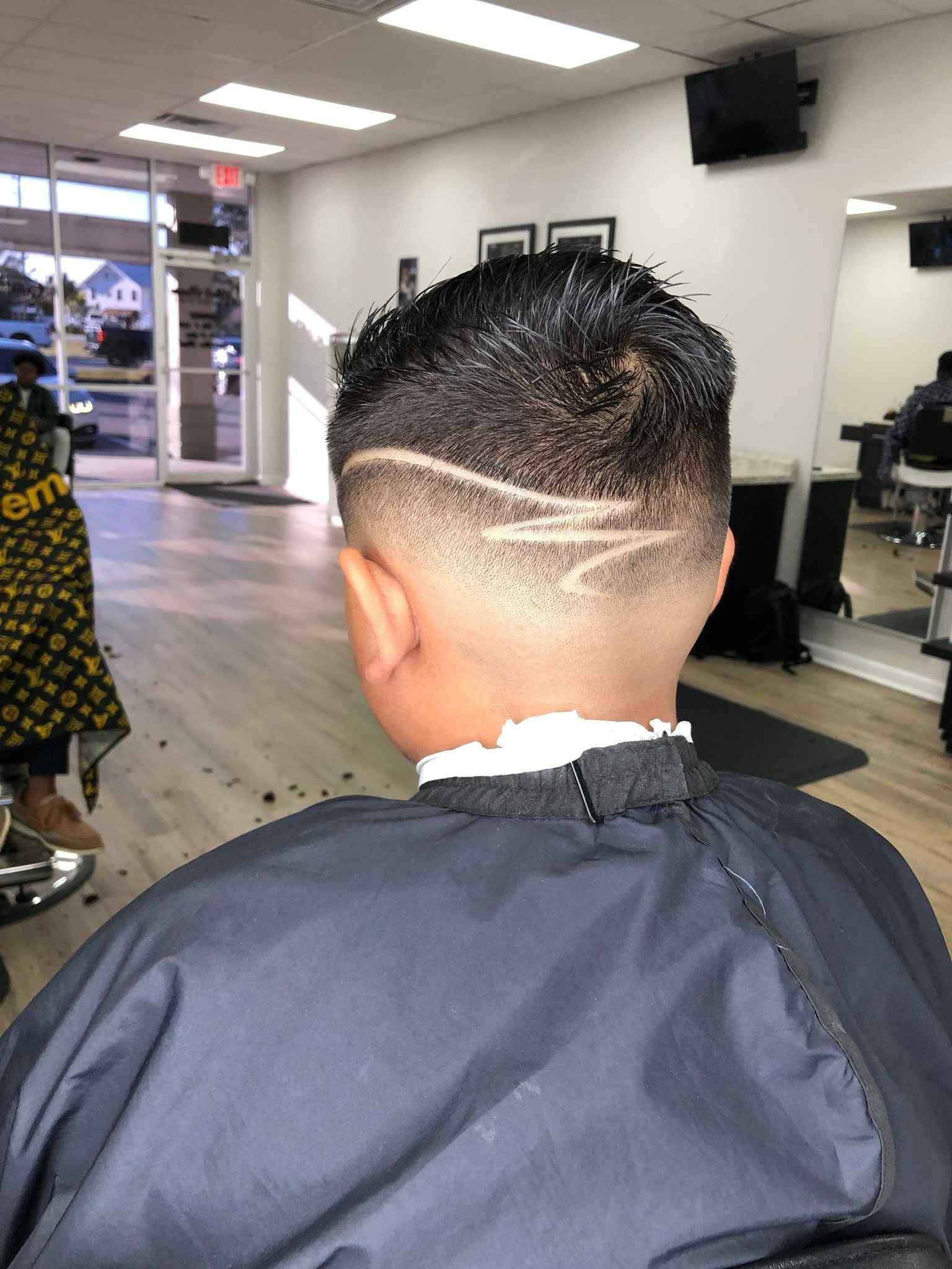 Barbershop in Lake Wales, FL giving a fresh skin fade at Marathon Barber Studio