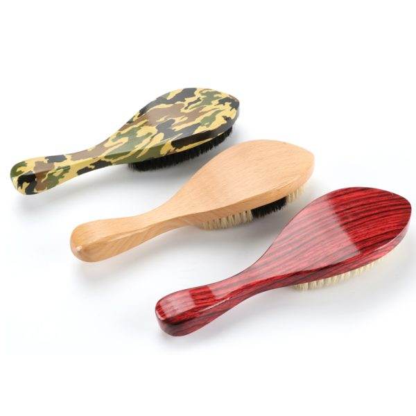 Featuring the Marathon Wave Brush, this set includes three wooden hairbrushes each with a unique design: one in camouflage, one plain, and one with red stripes. The bristles face down, making these stylistic brushes ideal for any barber in Bartow.